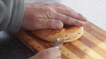 Preparing a bagel with care in the kitchen video