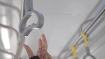 Public transport grip handle in city setting video
