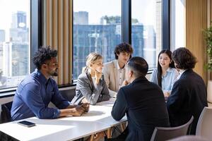 Team of diversity business people discussing over new strategic strategy project on investment real estate while working in modern office building for new project and planning photo