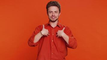 Caucasian man feeling very proud pointing himself overjoyed by success making choice self-confident video