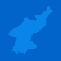 Blue halftone dot outline map background of North Korea vector
