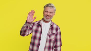 Happy man smiling friendly waving hands gesturing hello greeting or goodbye, meeting invitation video