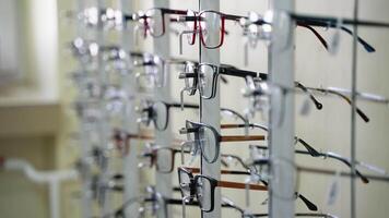 Eyeglasses rotating on display stand in optical store video