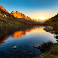 Sunset Over a Calm Alpine Lake with Mountain Reflections photo