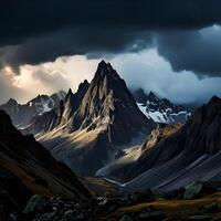 Dramatic Mountain Peak in a Dark Cloudy Sky photo