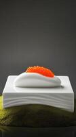 Minimalist presentation of red caviar on a porcelain slab with verbena foam at a contemporary dining experience photo