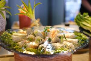 Spring Rolls on a Plate with Sauce photo