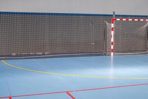 detail of a field with goal for futsal and handball practice, sports court photo
