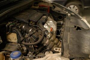 mechanics view of a complex internal combustion engine photo