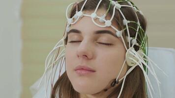 Patient brain testing using encephalography at medical center 20 video