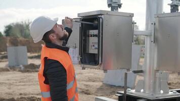Setting up equipment at a transformer substation. Construction of a transformer substation 7 video