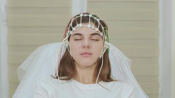 Patient brain testing using encephalography at medical center 19 video