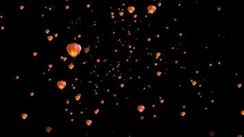 Hundreds of hot air lanterns illuminate the night sky, creating a magical and dreamy atmosphere. Perfect for backgrounds and event promotions. video