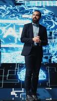 Vertical Technician specialist making AI brain neural networks business pitch at a tech convention, hosting a live conference to discuss about deep learning benefits. Business technology growth. Camera B. video