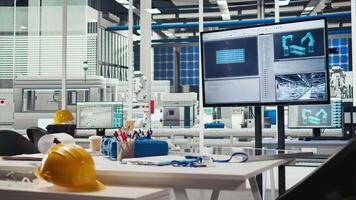 Research and development office in manufacturing plant used to study solar energy systems. Display on desk in empty photovoltaics factory used to improve efficiency and innovate video