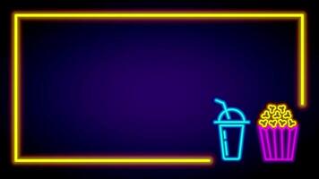 A neon rectangular frame simulates a theater screen while a popcorn and drink combo stands in the foreground, radiating movie night vibes video