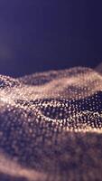 Abstract waves of golden dots forming flowing fields over a violet background, evoking data visualization and digital landscapes video