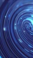 Spiraling rings of blue data light form a tunnel effect, creating a hypnotic visualization of movement through digital space video