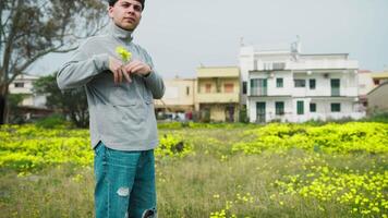 Man Putting Yellow Flowers In The Shirt Pocket video