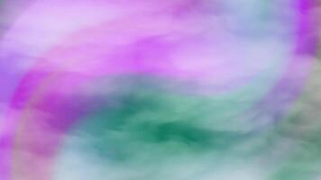 Blurry abstract background with clouds in pink, purple, and green hues suitable for presentations, web design, social media graphics, and artistic projects. video