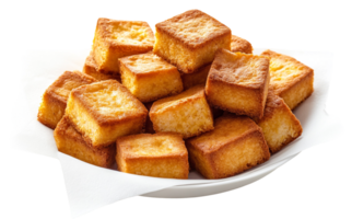 Rustic Cornbread Squares Piled on a White Plate with Napkin png