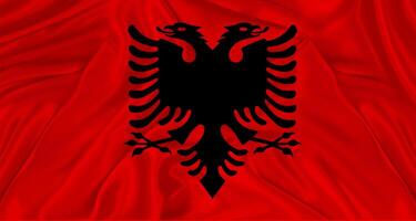 Flag of Albania with cloth texture. Close up of Albania flag waving photo