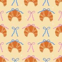 Seamless pattern of croissants and bows. graphics. vector