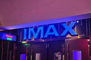 Bangkok, Thailand May 17, 2025 IMAX sign. IMAX is a movie format and theater system known for its large screens, high-resolution images, and immersive sound. photo