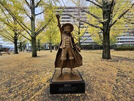 Kumamoto, Japan November 17, 2023 Luffy statue in front of Kumamoto Prefectural Government Building. photo