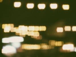 Blurred Bokeh Light with Scratch and Grain Background with Light Leak photo