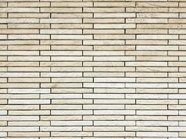Light Colored Bricks Wall Background in Repeating Horizontal Pattern. photo