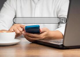 Data search technology. Businessman using a smartphone to search data from the internet photo