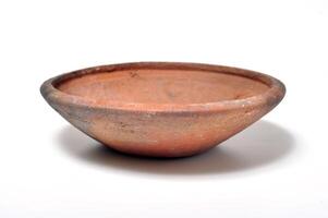 Plate-shaped containers made from clay white background photo
