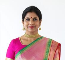 A woman in a pink and green sari. photo