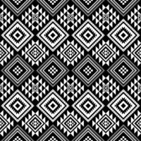 A bold black and white seamless pattern with Aztec tribal diamond and triangle motifs. Ideal for textiles, modern boho decor, digital backgrounds, and fashion design. vector