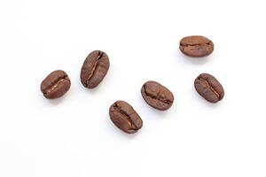 Top view coffee beans on white background photo