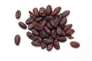 Isolated of cocoa beans, Brown cocoa beans on white background photo