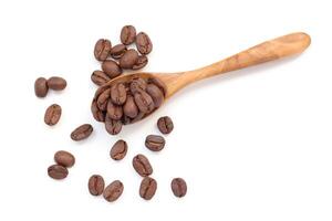 Isolated of coffee bean, Brown roasted coffee beans seeds isolated, coffee bean isolate, white background, bean isolated on white, coffee beans on a wooden spoon on a white background photo