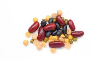 Top view of Red beans black beans soybean with mung bean isolated on white, isolated of Red beans black beans soybeans with mung beans, seeds on white photo