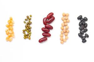 various types of beans and beans on a white background photo