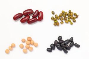 Top view of Red beans black beans soybean with mung bean isolated on white, isolated of Red beans black beans soybeans photo