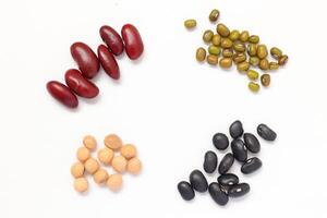Top view of Red beans black beans soybean with mung bean isolated on white, isolated of Red beans black beans soybeans, various types of beans and beans on white background photo