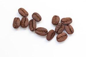 Closeup of coffee beans on white background photo