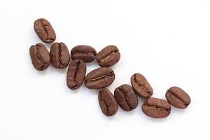 Closeup coffee beans on white background photo
