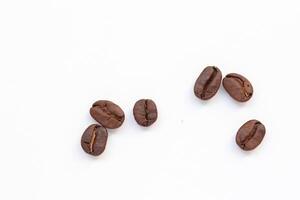 Isolate of coffee bean, Brown roasted coffee beans seeds isolated, coffee bean isolate, white background, bean isolated on white background photo