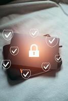 Protection from cyberattacks. Laptop security encryption with authentication app. photo