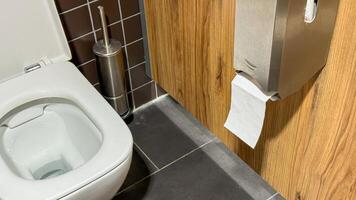 Sleek modern restroom corner whispers hygge serenity, with minimalist toilet harmony, nurturing Earth Day sustainability and World Toilet Day themes photo