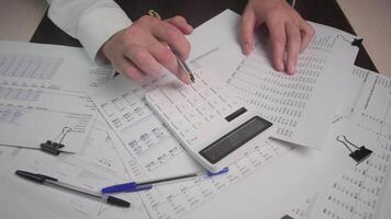 A focused workspace that displays calculations, key documents, and highlights important financial tasks video