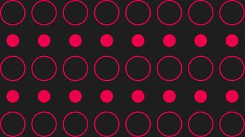 Animated abstract geometric pattern of red circles and dots on a dark black background. video