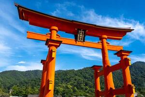 Close-up view of the famous Itsukushima shrine red torii gate in Miyajima, Japan photo